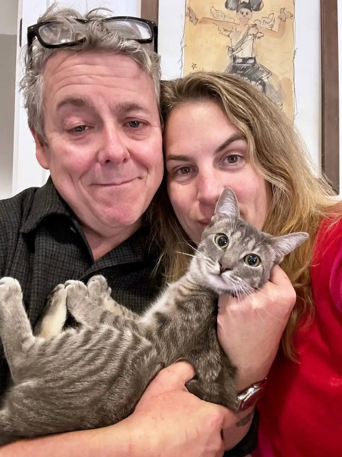 Keith Kinsella professional cat sitter with wife Daniela and their cat Mojo in Jersey City, New Jersey